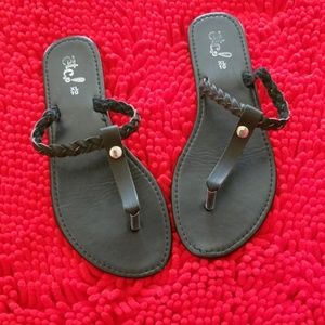 Black braided flip flops